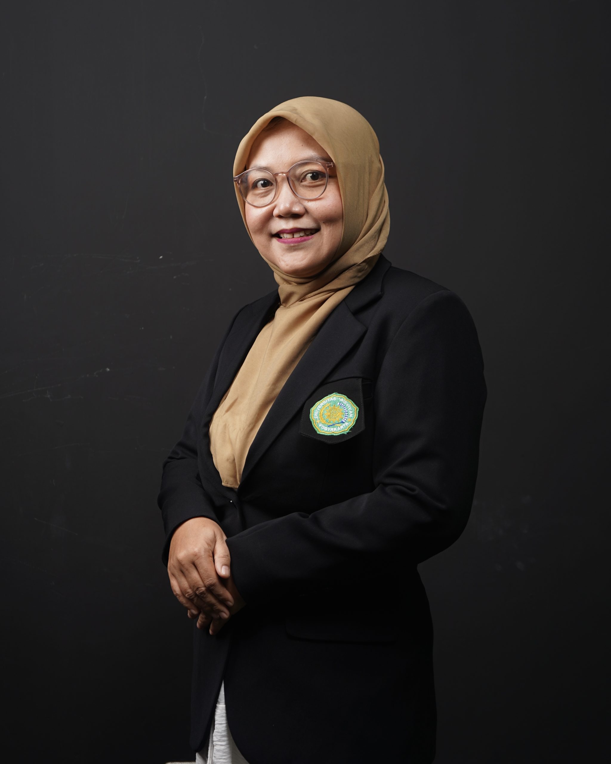 Enny Fitriahadi, S.SiT., M.Kes.